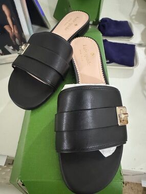 kate spade Black Leather Slide Mules with Gold Buckle Accent